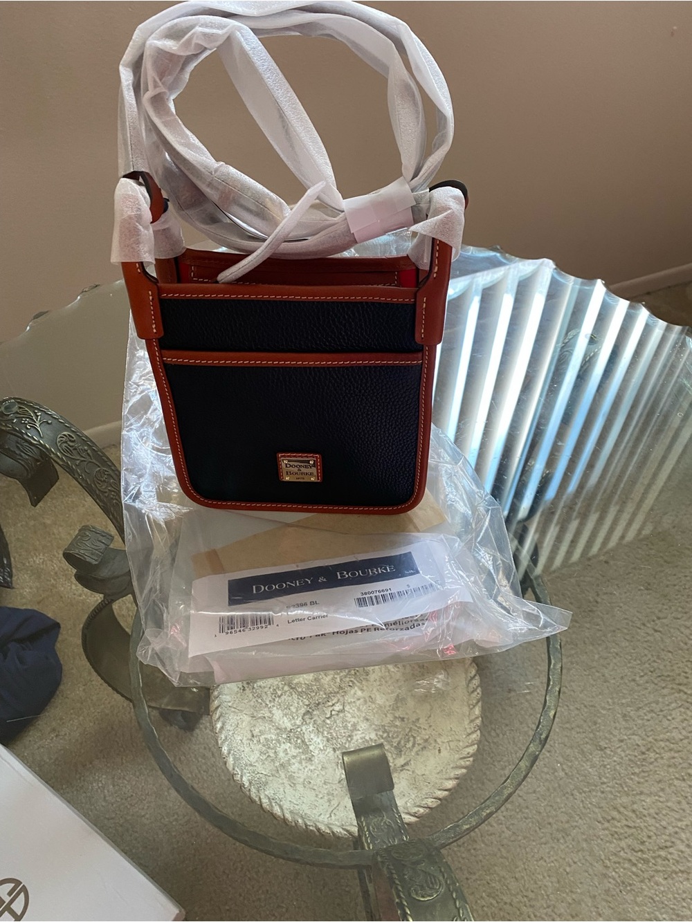 Dooney & Bourke Black with Brown Trim Crossbody Phone Pouch